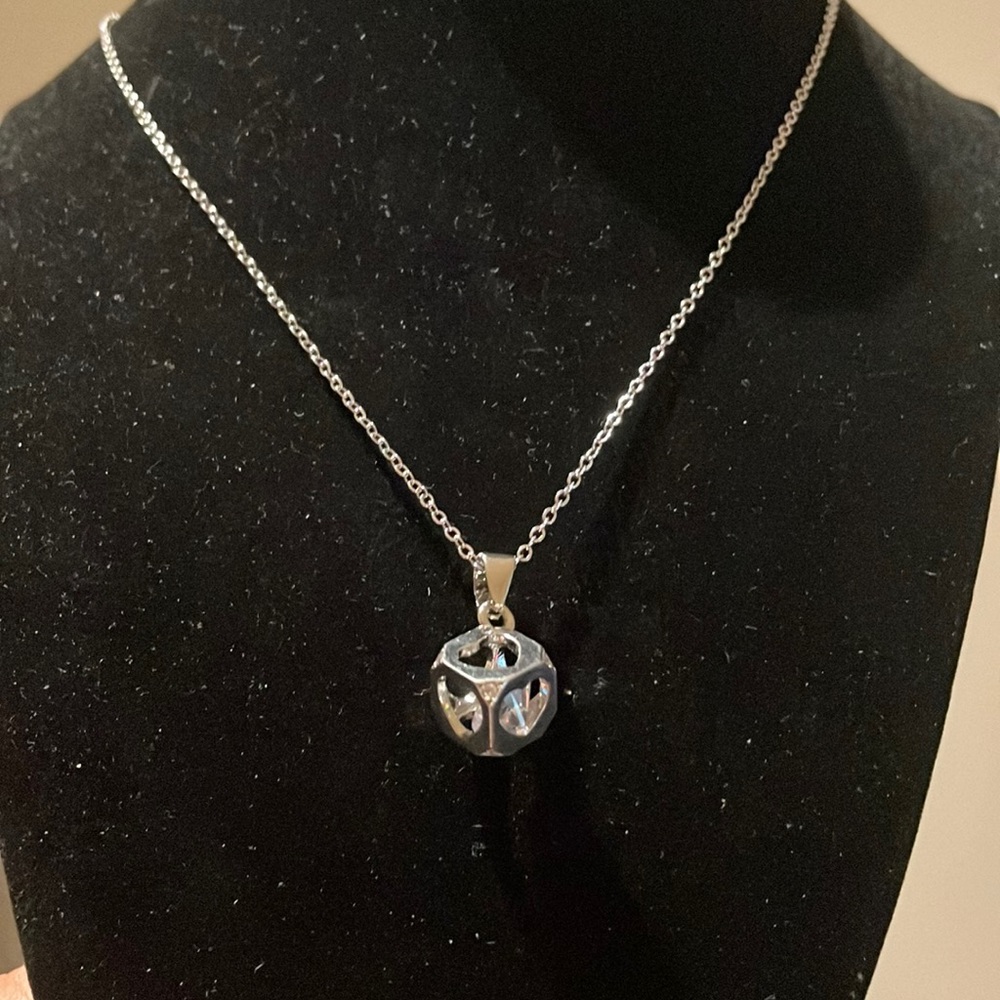 Little cube heart cut out shapes with a shiny Swarovski Crystal inside necklace